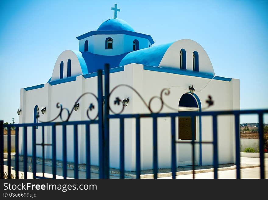 Beautiful small church behind the fence, somewhere on island Kos, Dodecanese, Greece. Beautiful small church behind the fence, somewhere on island Kos, Dodecanese, Greece