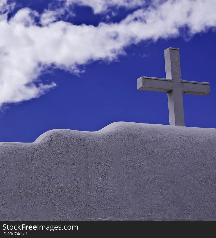 A White Cross Against A Blue Sky. A White Cross Against A Blue Sky