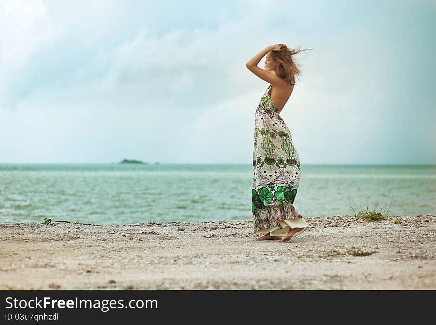 Woman walking on beach