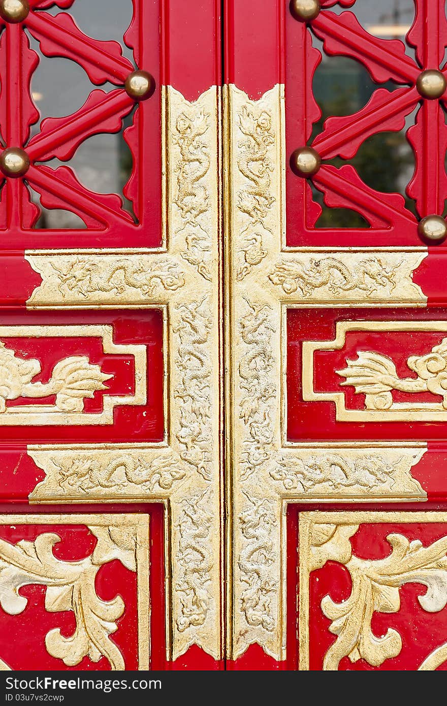 Red door with yellow Chinese Decorative pattern. Red door with yellow Chinese Decorative pattern