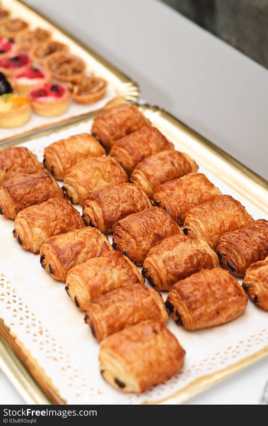 Small french chocolate pastry also named petit pain au chocolat. Small french chocolate pastry also named petit pain au chocolat