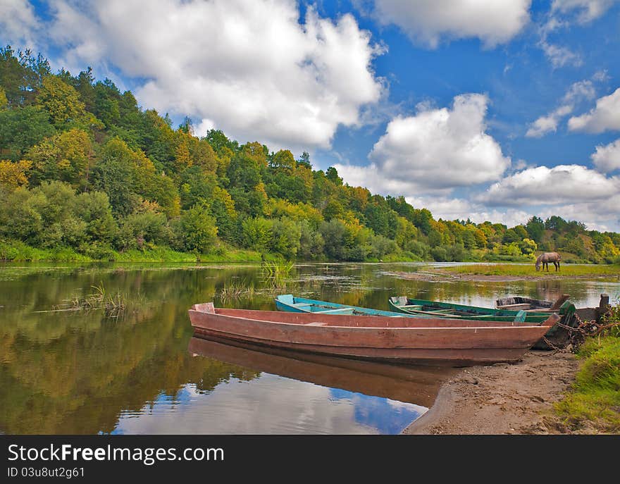 Old Boats In River