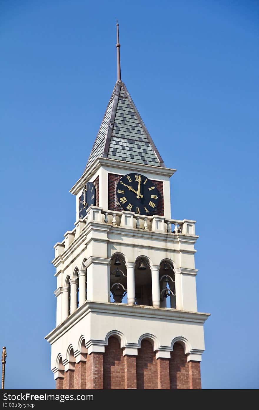 Building clock tower and a bell.