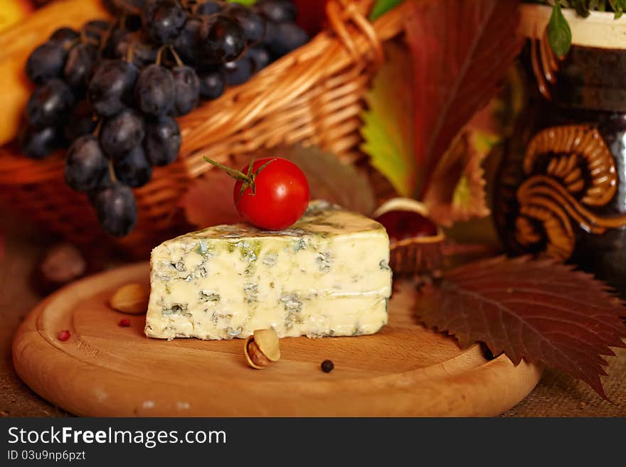 Still life with autumn vegetables , fruits and cheese. Still life with autumn vegetables , fruits and cheese