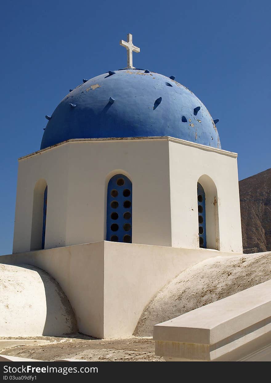 Blue and White Greek Church Against Blue Sky