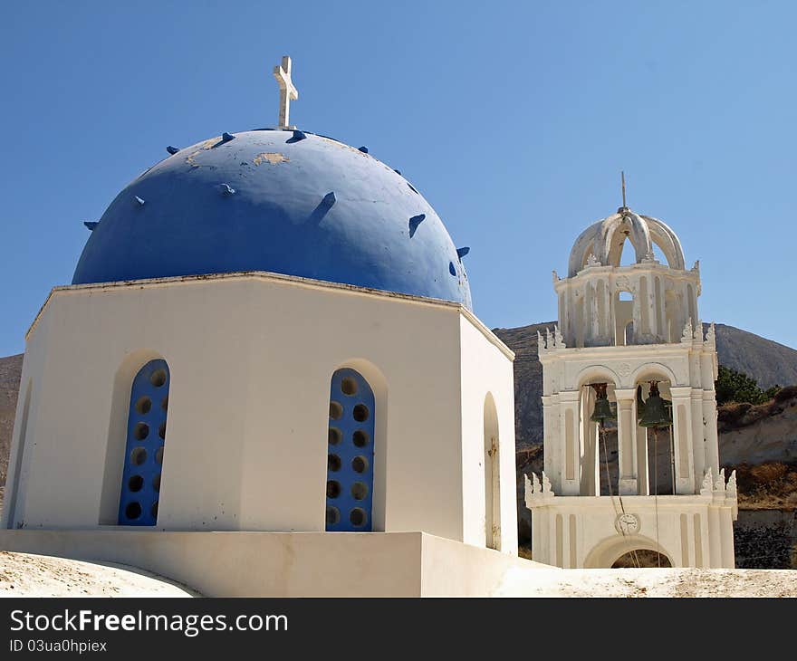 Blue and White Greek Church Against Blue Sky