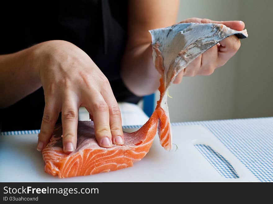 Removing salmon skin