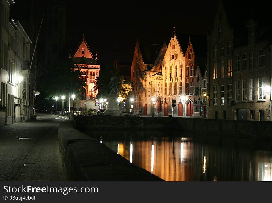 View of some ancient houses and a canal in the historical town of Brugge in Belgium. View of some ancient houses and a canal in the historical town of Brugge in Belgium.