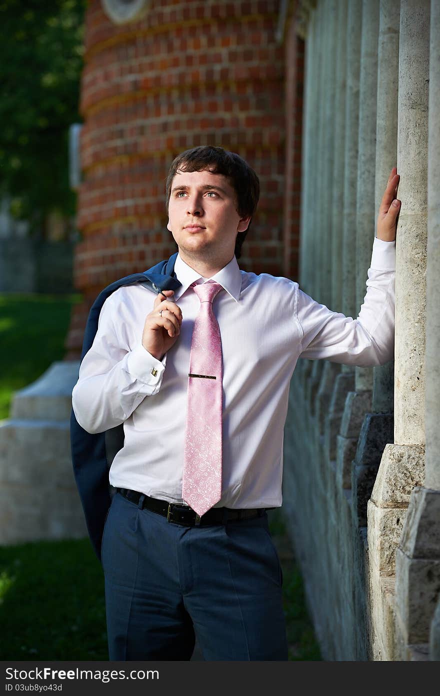 Portrait of happy groom in wedding walk