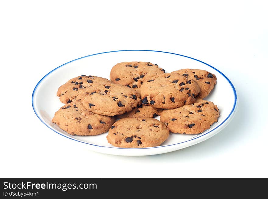 Cookie chips with dark chocolate on plate. Cookie chips with dark chocolate on plate