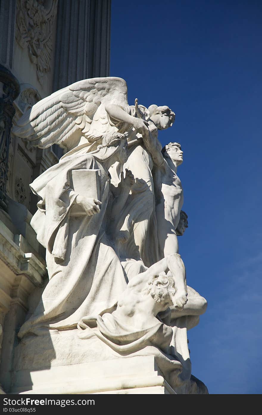 Antique sculpture of 1922 at El Retiro public park in Madrid Spain. Antique sculpture of 1922 at El Retiro public park in Madrid Spain