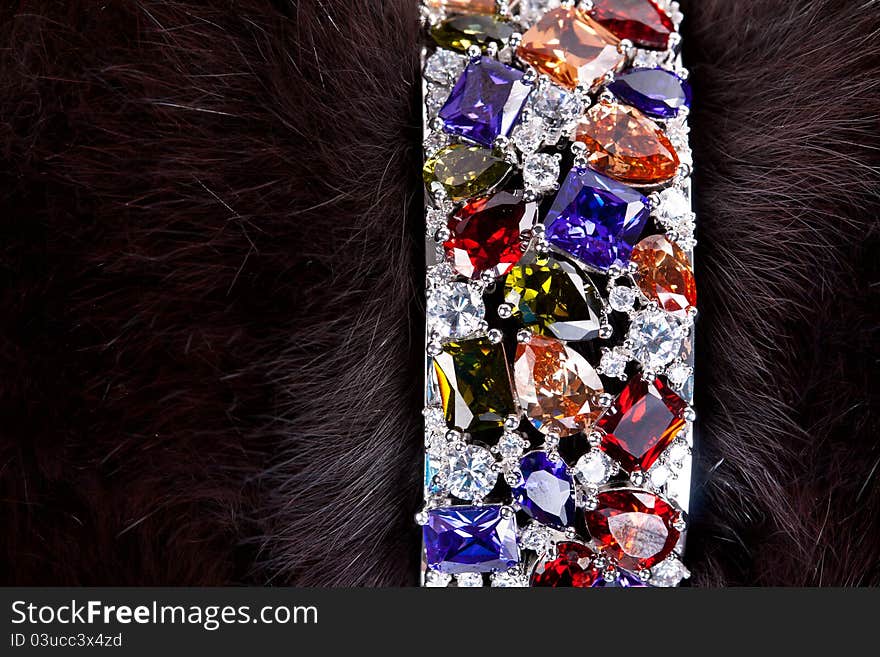 Bracelet with precious stones in a fur