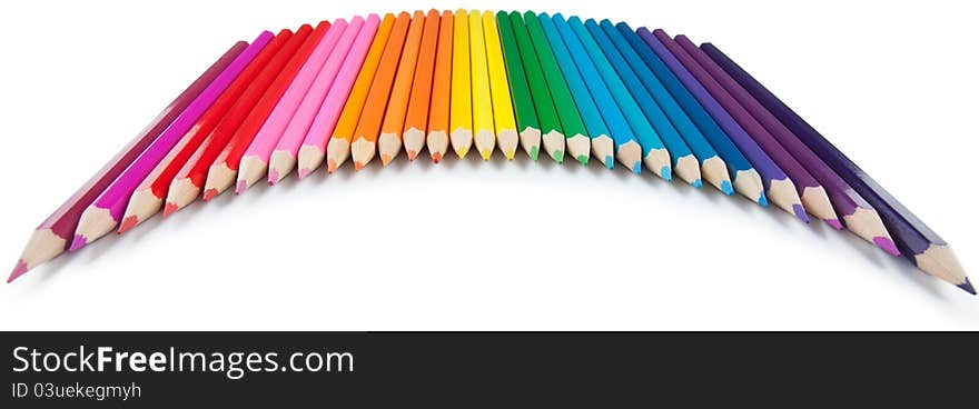 Assortment of color pencils on white background