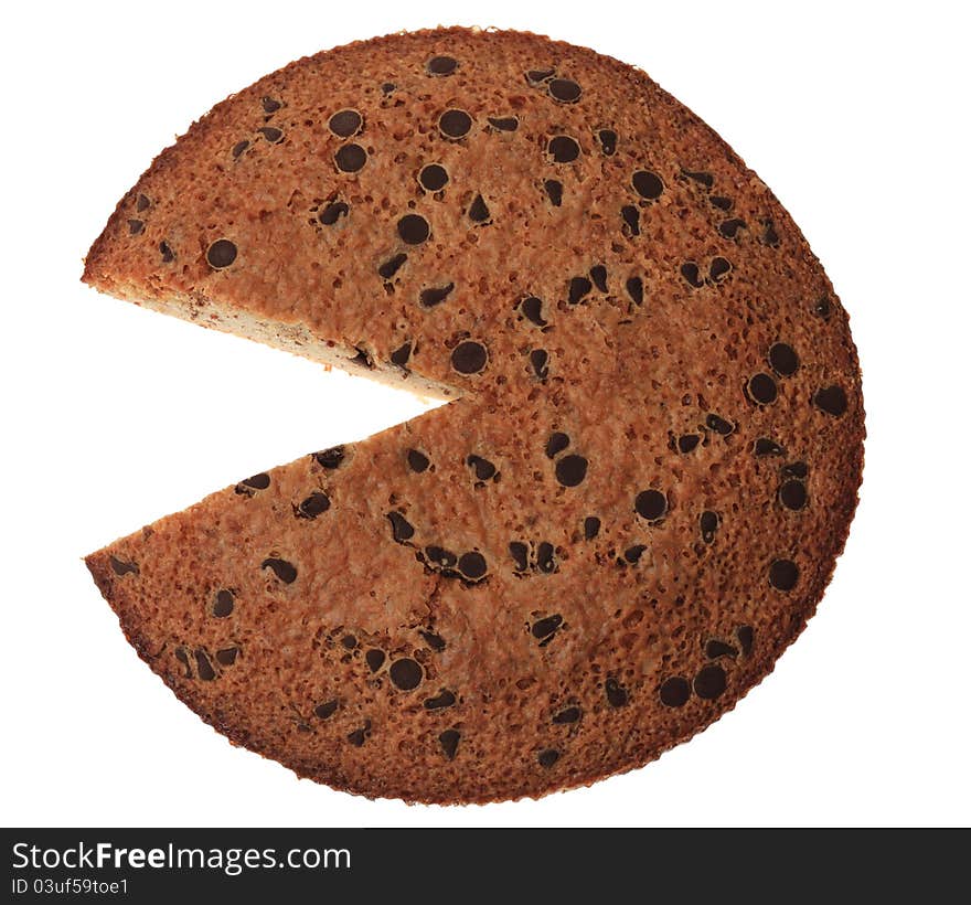 Upper view of a French round cake with a piece missing, isolated against a white background. Upper view of a French round cake with a piece missing, isolated against a white background