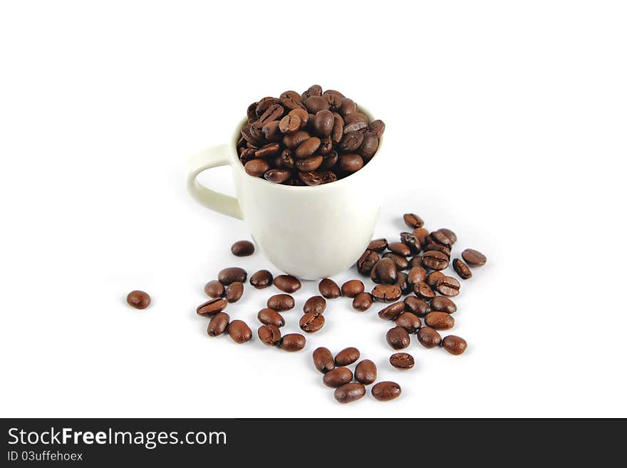 Coffee beans in white cup