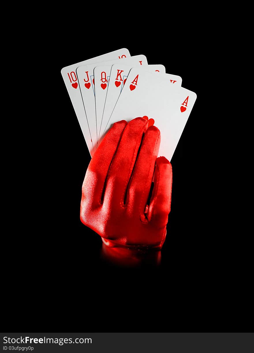 Female hand with royal flush on black bacground. Female hand with royal flush on black bacground