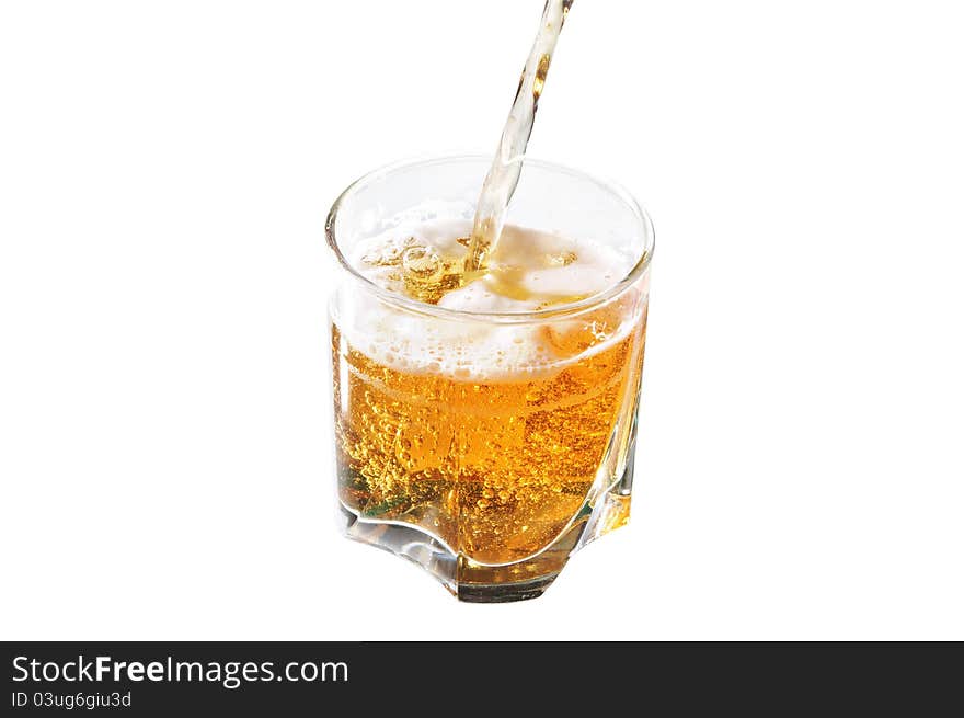 Glass of beer on white background