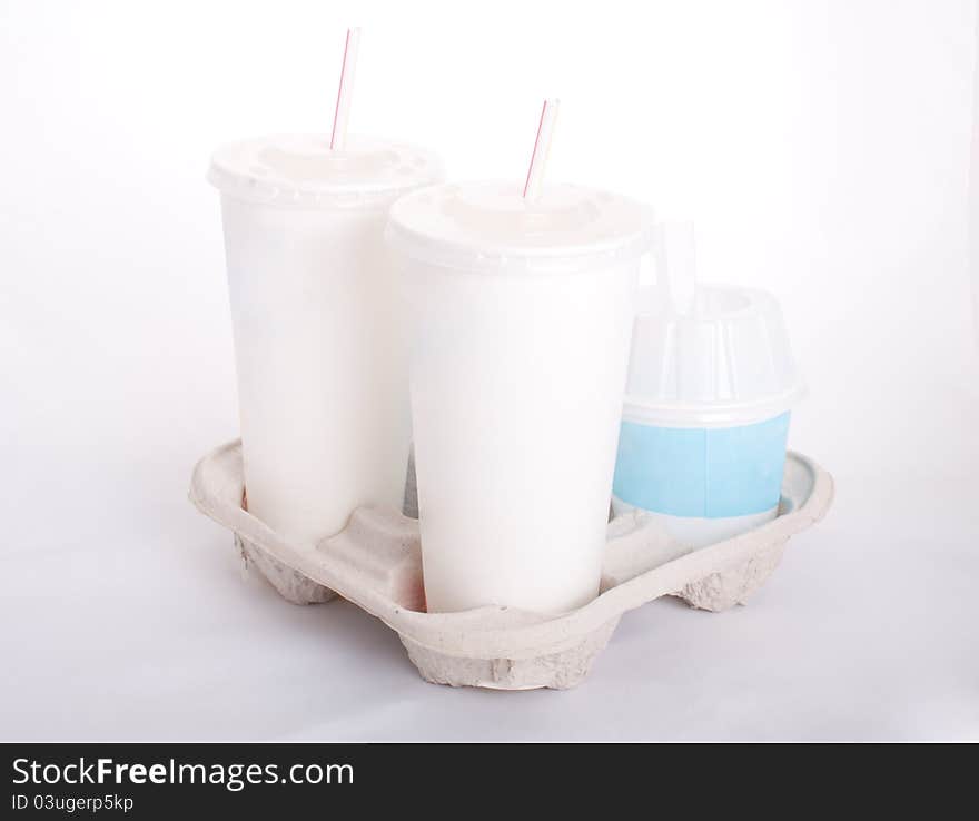 A set of fast food beverages in a tray