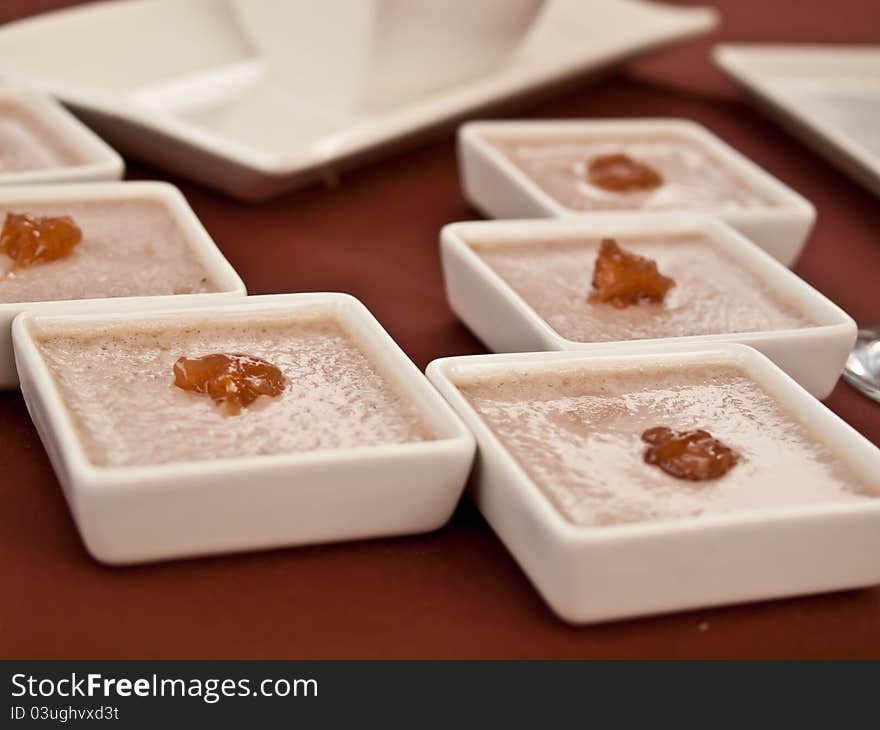 Sweet jelly with jam in little plates.