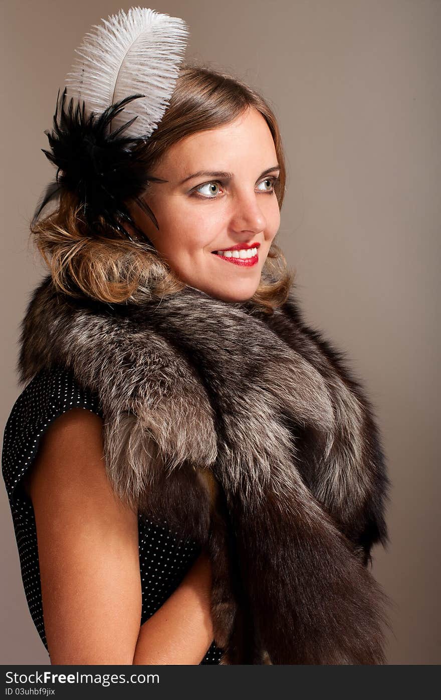 Retro Woman With Feather And Fur