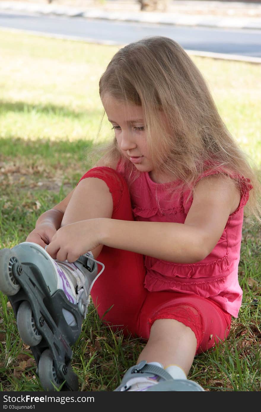 Portrait of a girl dressing rollers