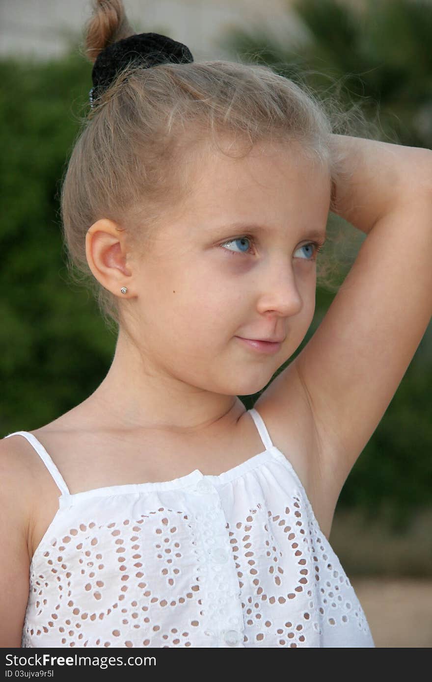 Portrait of a girl child with blue eyes