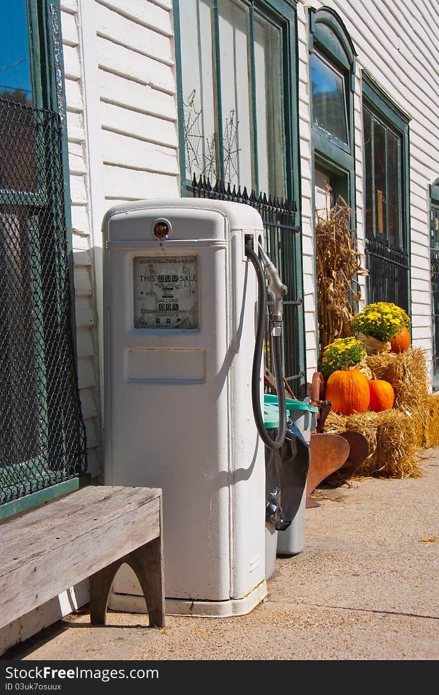 Retro gas pump outside an old store in North Carolina. Retro gas pump outside an old store in North Carolina.