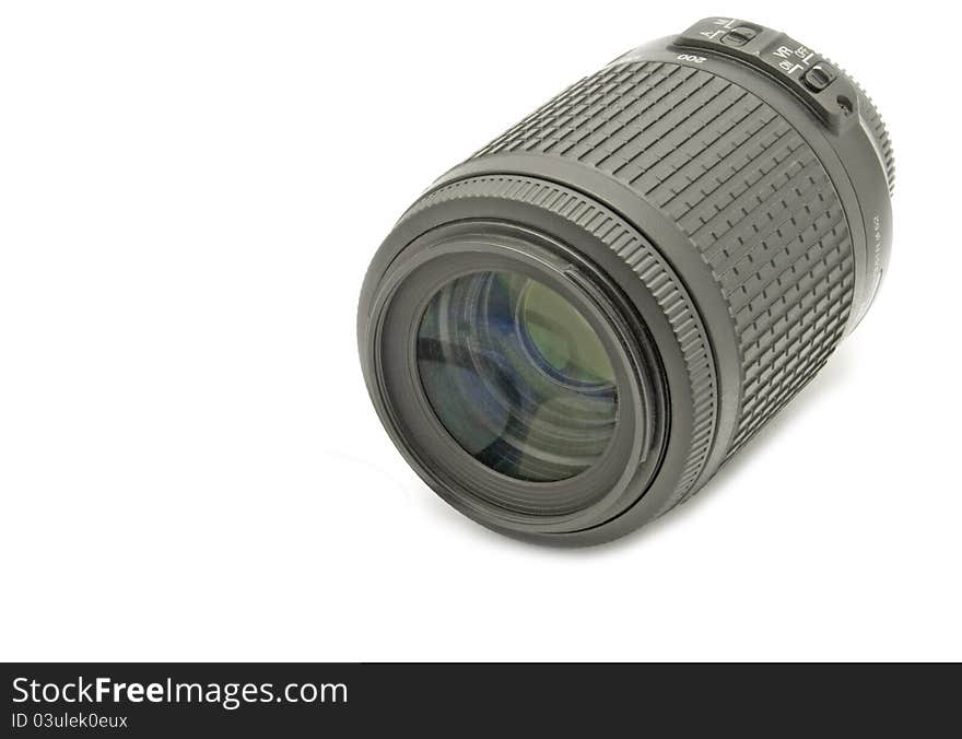 Camera objective and one lens for photo cameras on white background