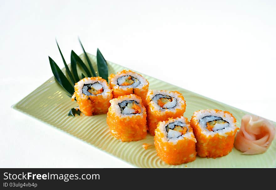 Egg imitation crabmeat cucumber tuna and salmon roll sushi. Egg imitation crabmeat cucumber tuna and salmon roll sushi