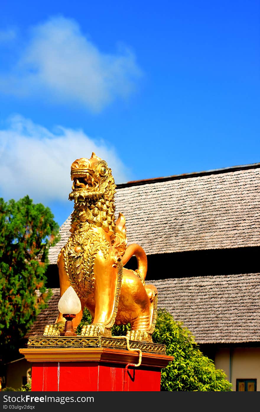 Stucco, a lion in front of a temple in Thailand. Stucco, a lion in front of a temple in Thailand