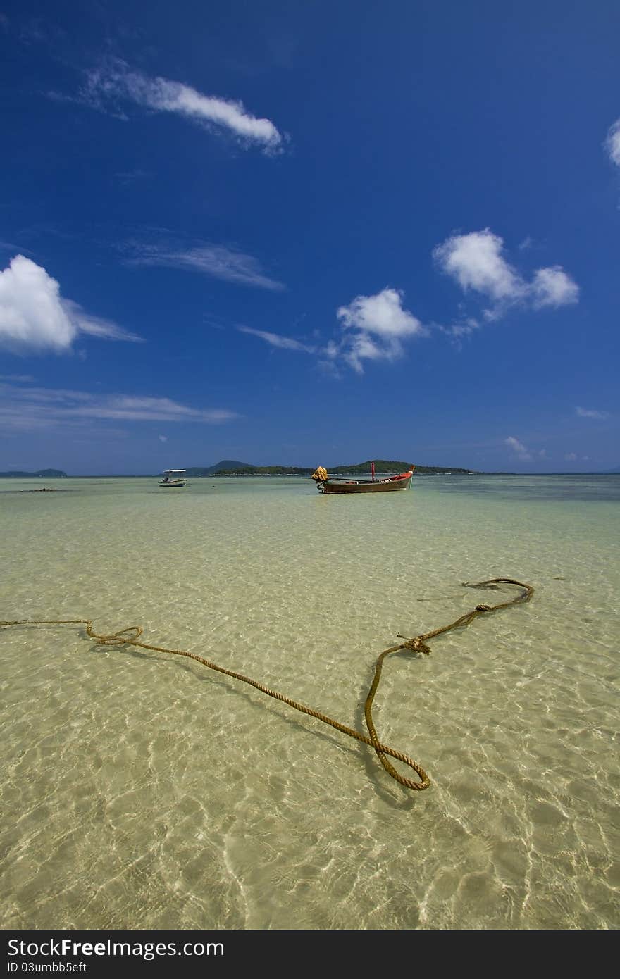 Fisher man boat in Rawai Beach.