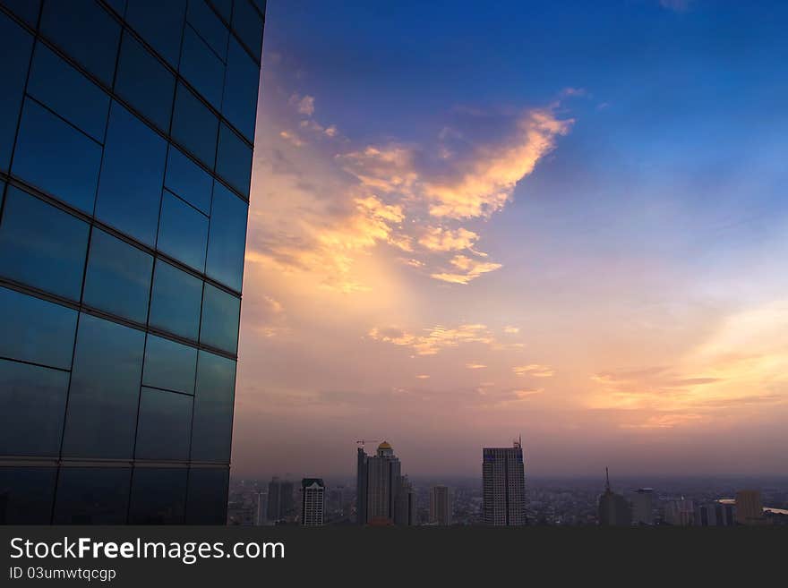 Top view building and reflection at sunset time