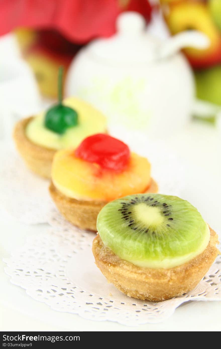 Creamy dessert tarts with fruits