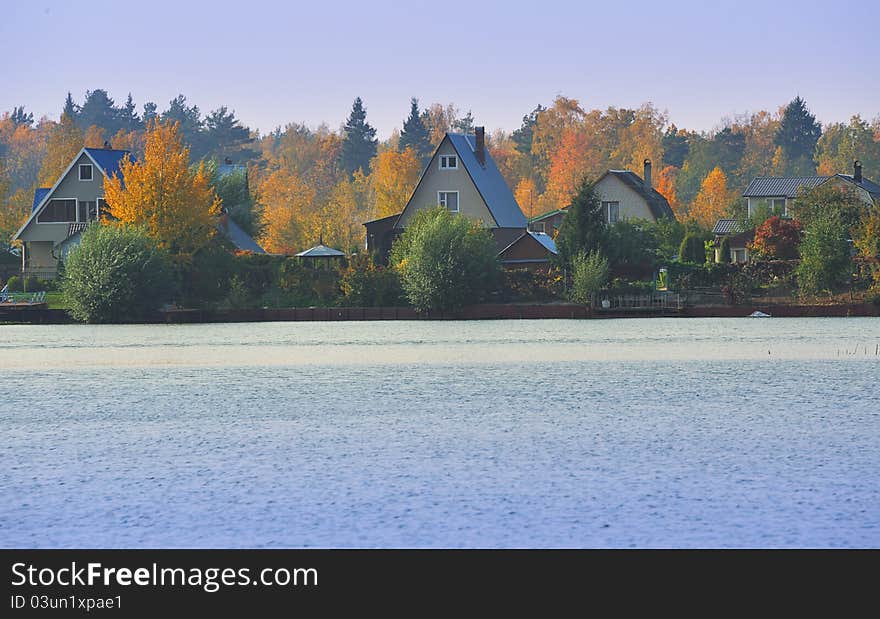 Village In Autumn Lake