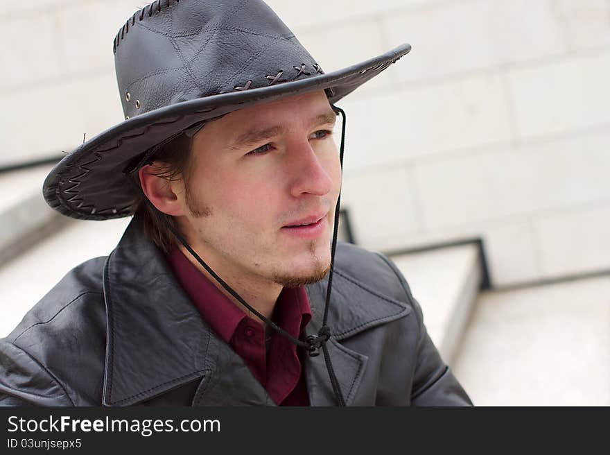 Man with beard and leather hat portrait