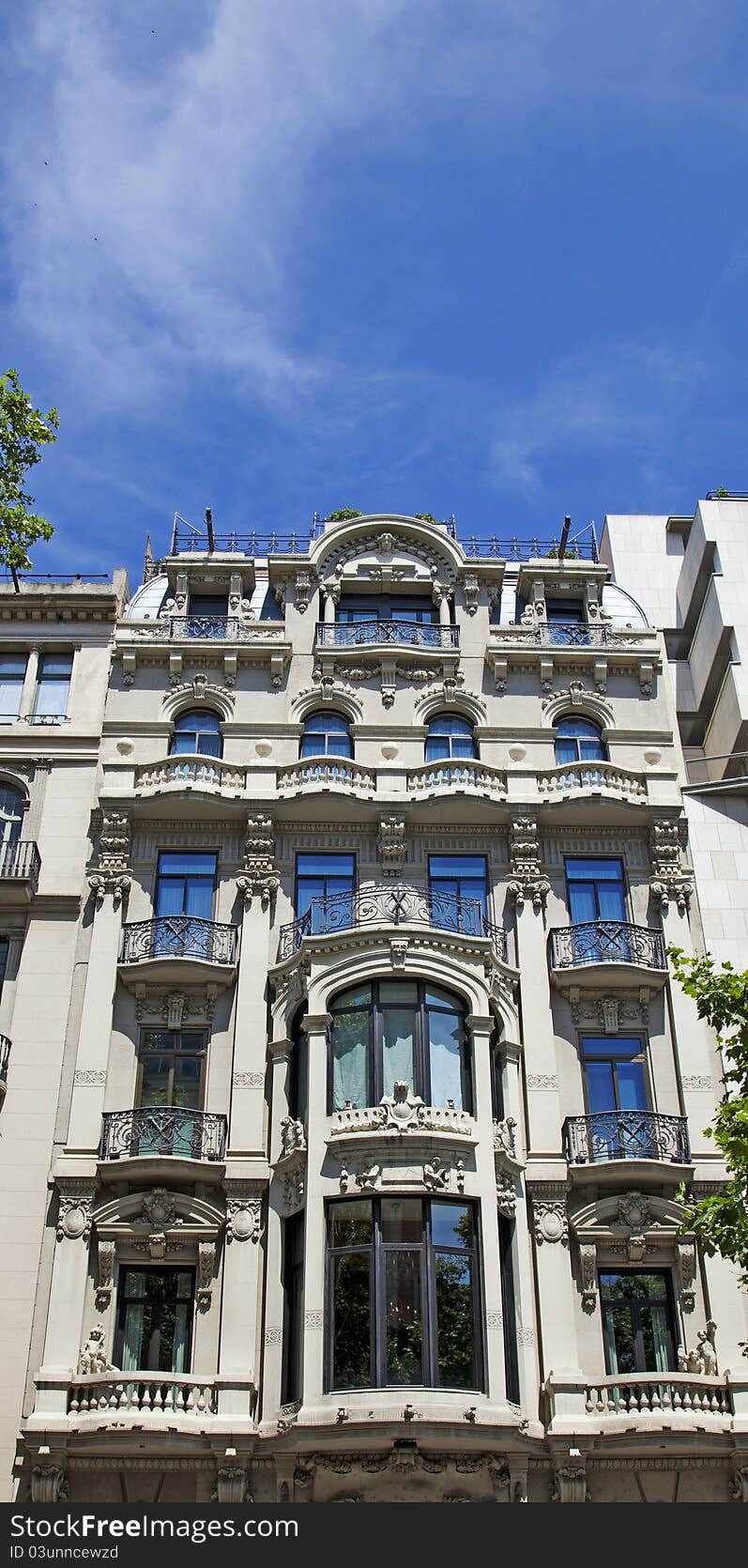 Nice facade with windows and balcony