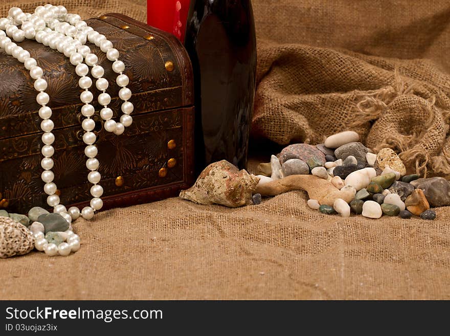 Chest with treasure, sea pearls and stones