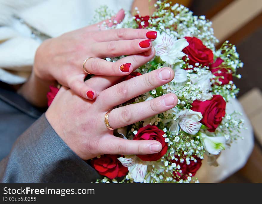 Hands on a bouquet