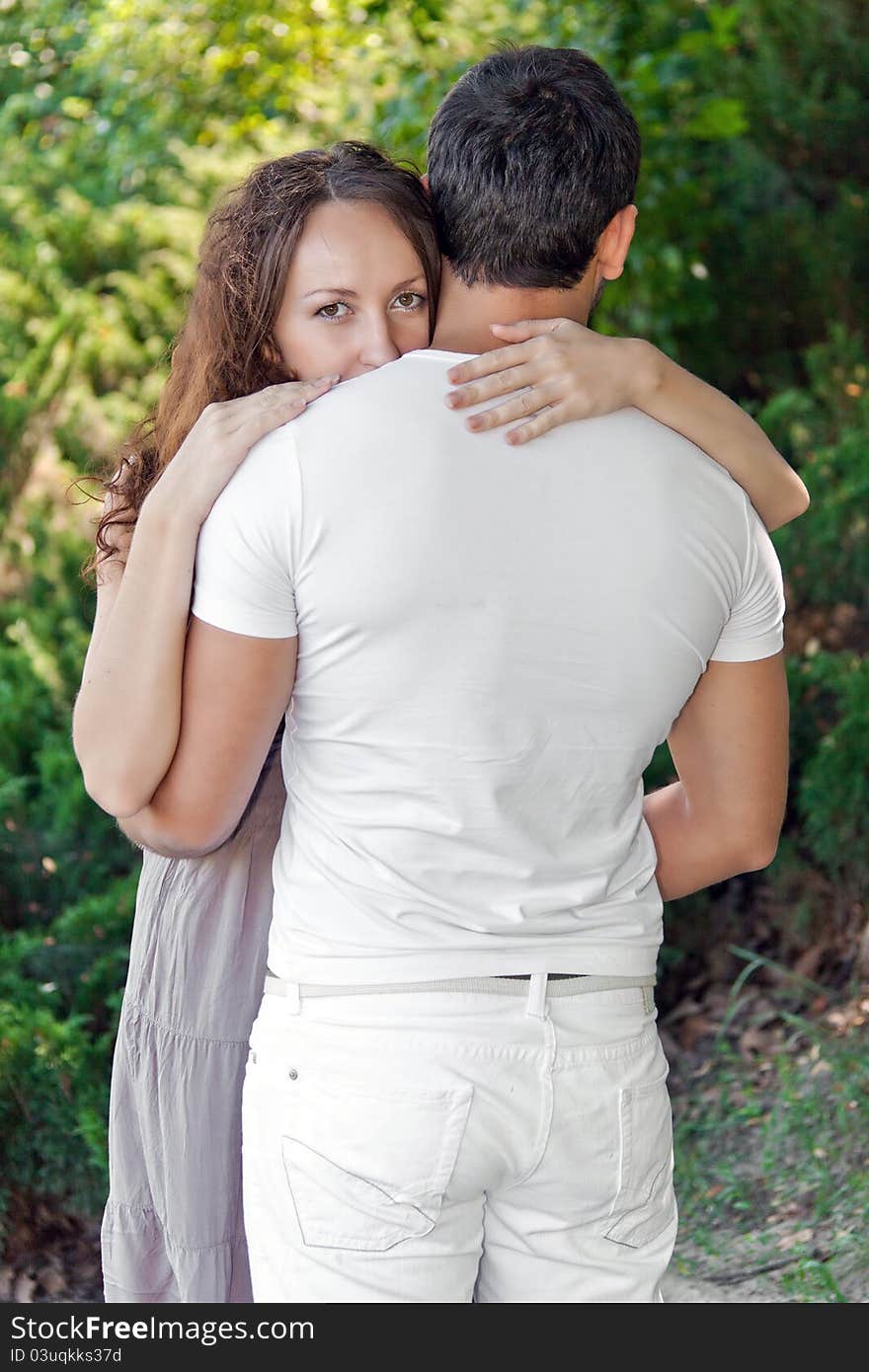 Portrait of amorous couple in the park. Portrait of amorous couple in the park