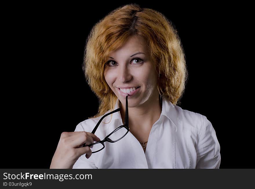 Portrait of smiling young girl isolated on black. Portrait of smiling young girl isolated on black