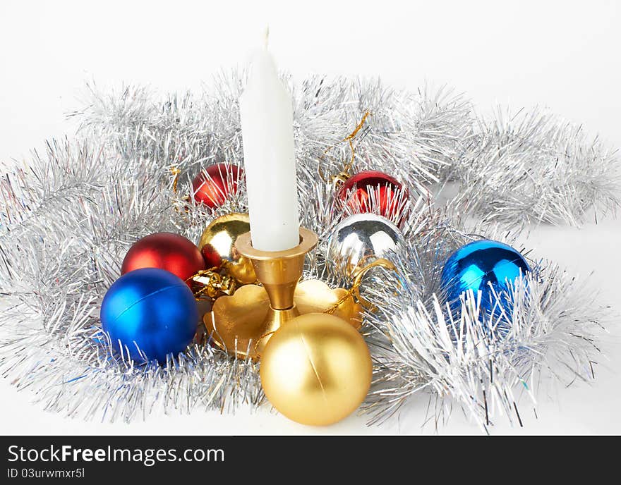 Christmas and New Year decoration- balls and candle .On white background