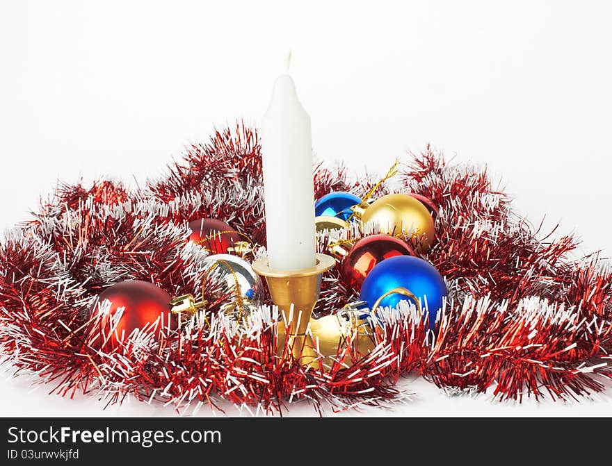 Christmas and New Year decoration- balls and candle .On white background