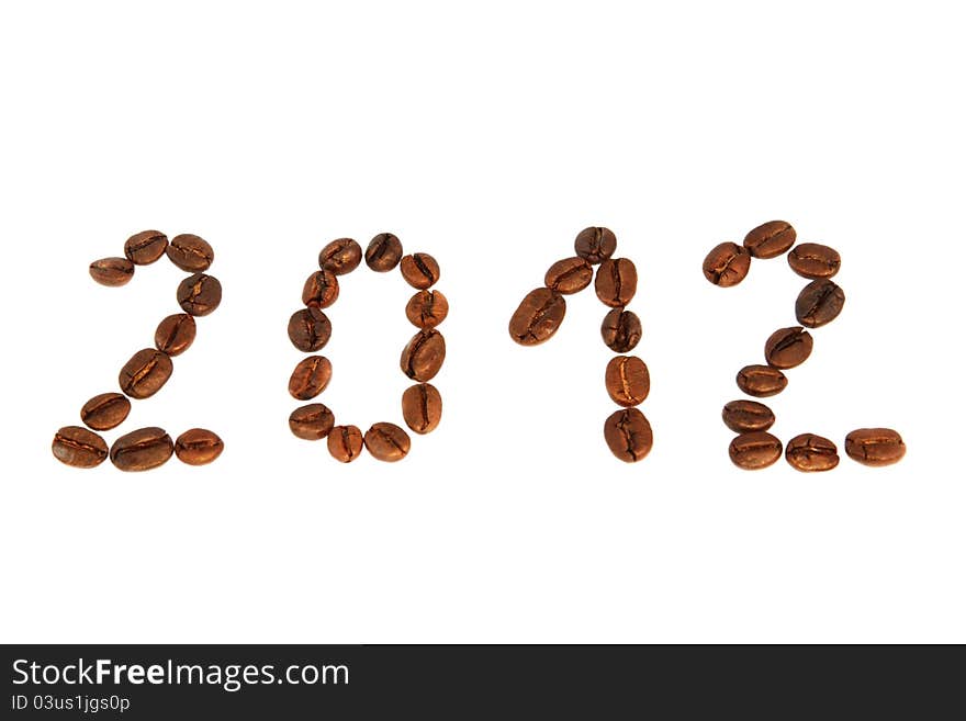 Coffee with granules and new year 2012 on a white background.