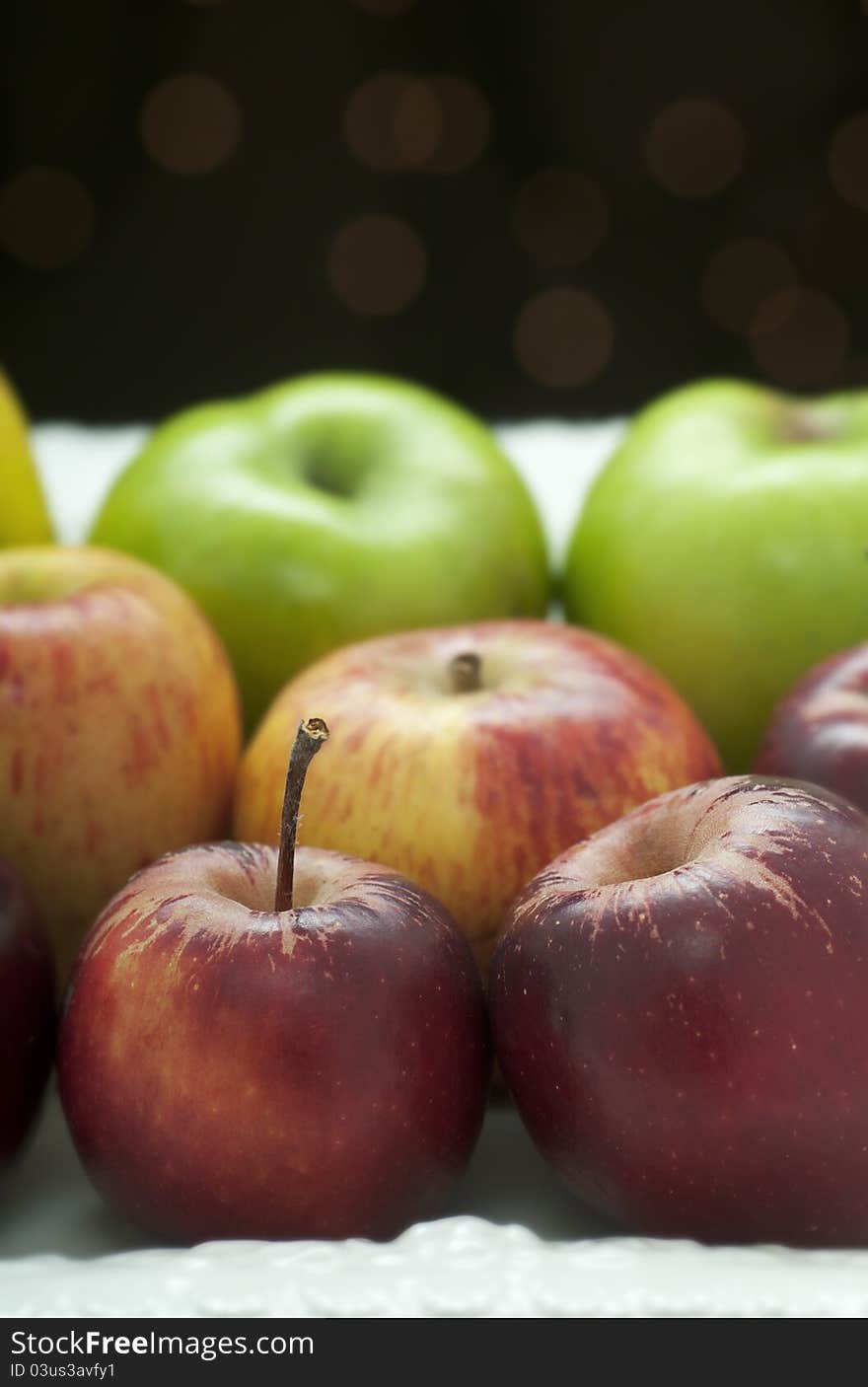 Platter of different colored organic fresh apples. Platter of different colored organic fresh apples