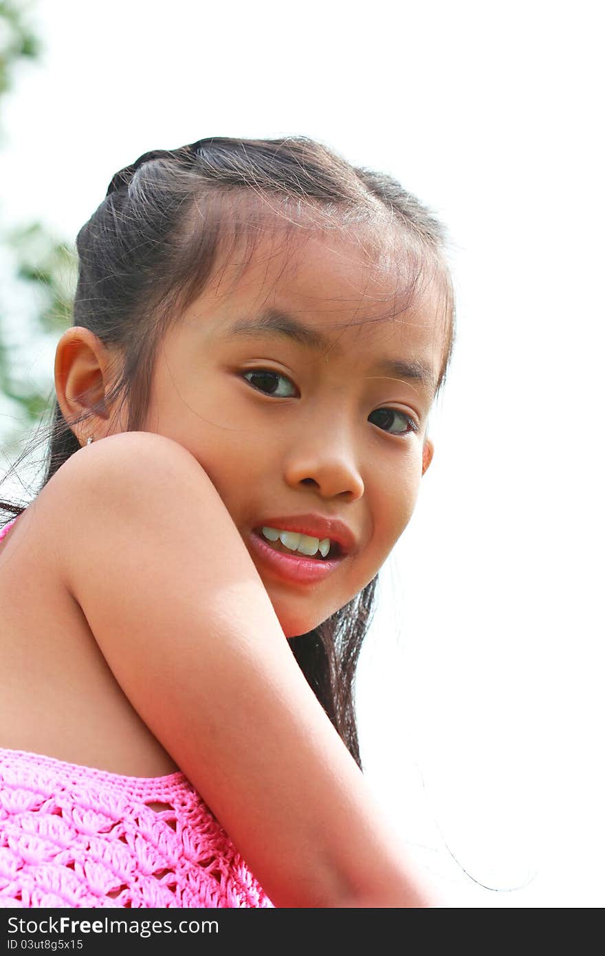 Cute of young girl playing the park