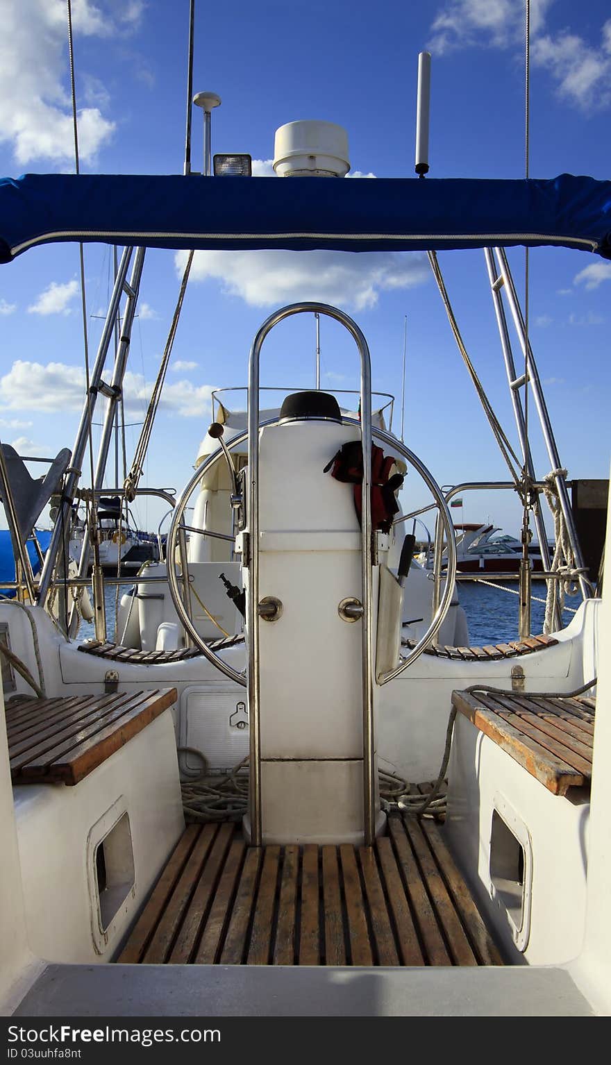 Moored yacht in a marina showing location of crew and passengers. Moored yacht in a marina showing location of crew and passengers.