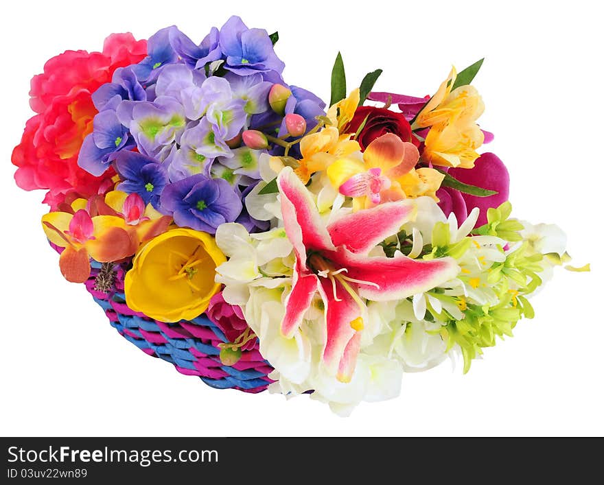 Basket of flowers over white. Basket of flowers over white.