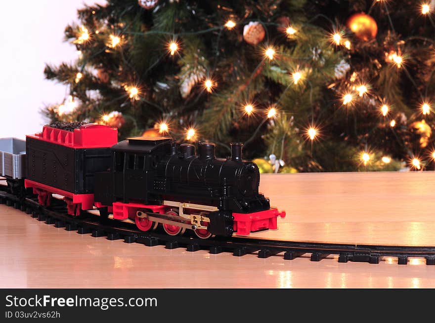 Train toy with christmas tree . Train toy with christmas tree .