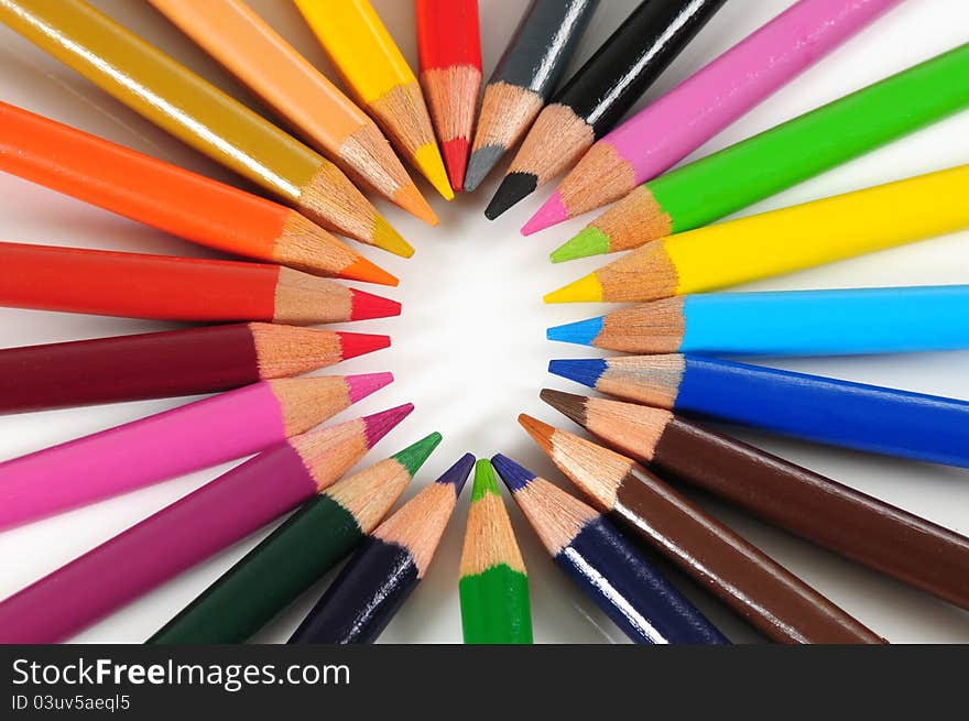 Arranged color pencils in a circle. Arranged color pencils in a circle.