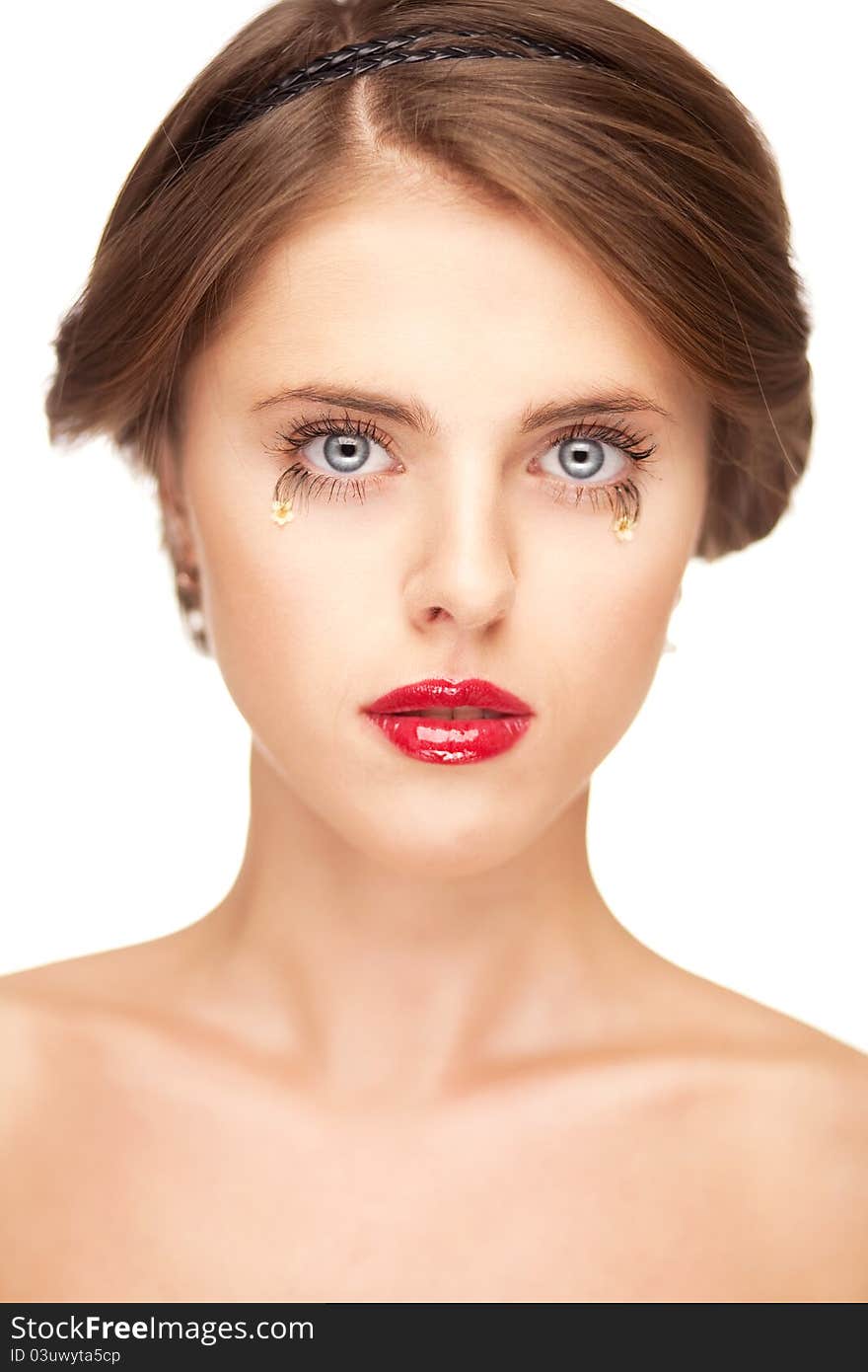 Studio portrait of attractive young woman on white background